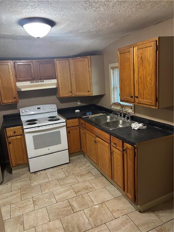 6941 Spruce Ave, Kansas City, MO 64132 - kitchen featuring electric range, under cabinet range hood, a textured ceiling, brown cabinets, and dark countertops