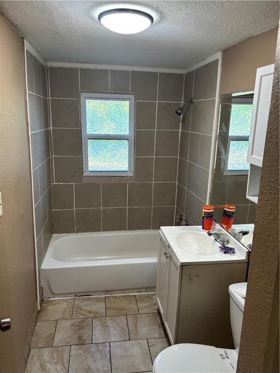 6941 Spruce Ave, Kansas City, MO 64132 - full bath featuring a textured ceiling, vanity, shower / washtub combination, and a textured wall