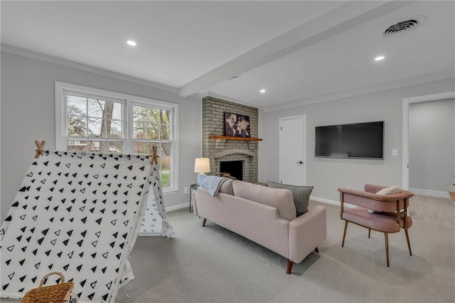 living room featuring beamed ceiling, visible vents, recessed lighting, and a brick fireplace