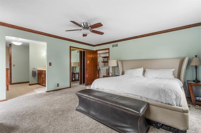bedroom with ornamental molding, visible vents, carpet, and baseboards
