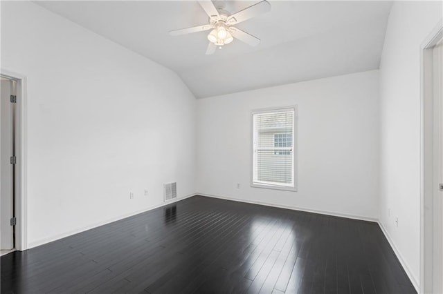 11273 S Lakecrest Dr, Olathe, KS 66061 - spare room featuring vaulted ceiling, dark wood-style floors, ceiling fan, and baseboards
