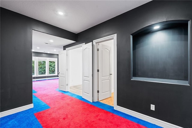 11273 S Lakecrest Dr, Olathe, KS 66061 - corridor featuring carpet floors, baseboards, and recessed lighting