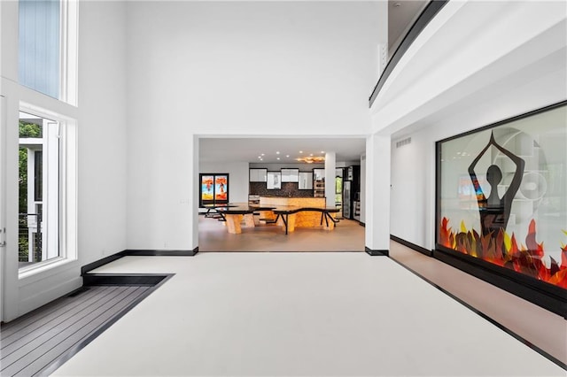 11273 S Lakecrest Dr, Olathe, KS 66061 - interior space featuring a high ceiling and plenty of natural light