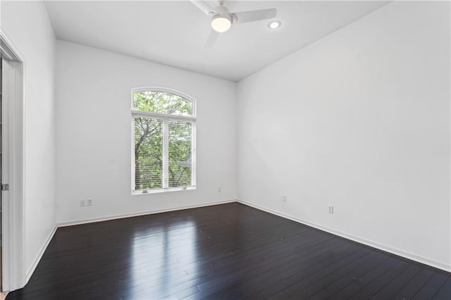 11273 S Lakecrest Dr, Olathe, KS 66061 - empty room featuring dark wood finished floors, ceiling fan, and recessed lighting