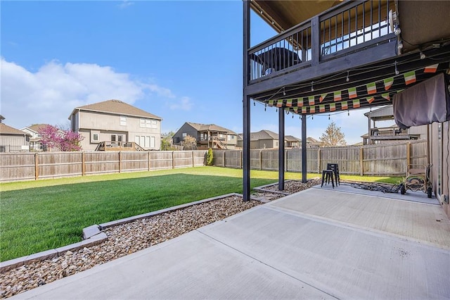 view of patio / terrace featuring a fenced backyard and a residential view