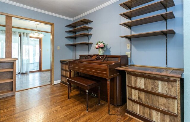 1306 W 29th St S, Independence, MO 64052 - sitting room with crown molding, wood finished floors, and a chandelier
