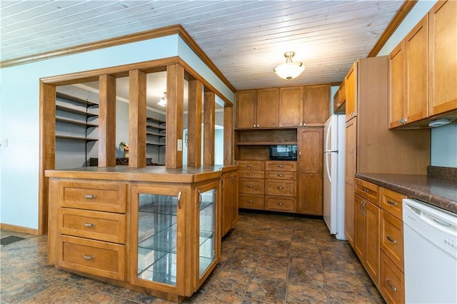 1306 W 29th St S, Independence, MO 64052 - kitchen with white appliances, stone finish flooring, dark countertops, brown cabinets, and crown molding