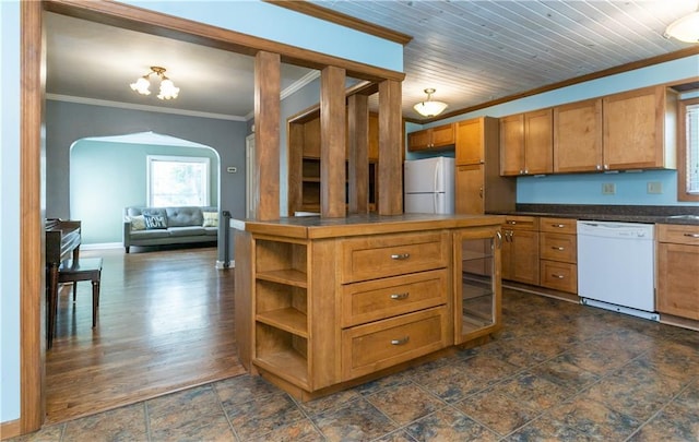 1306 W 29th St S, Independence, MO 64052 - kitchen with white appliances, ornamental molding, arched walkways, dark countertops, and brown cabinets