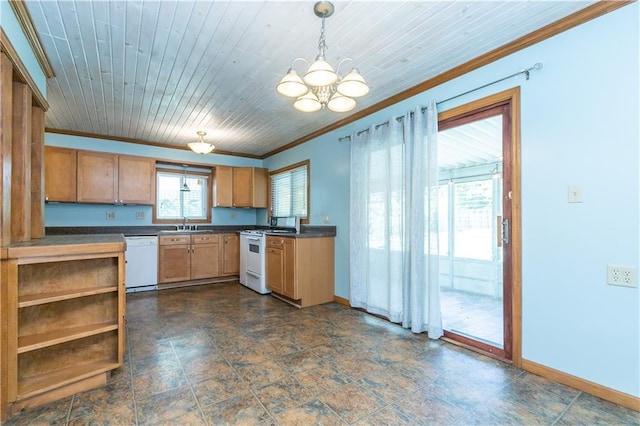 1306 W 29th St S, Independence, MO 64052 - kitchen with white appliances, crown molding, a chandelier, dark countertops, and pendant lighting