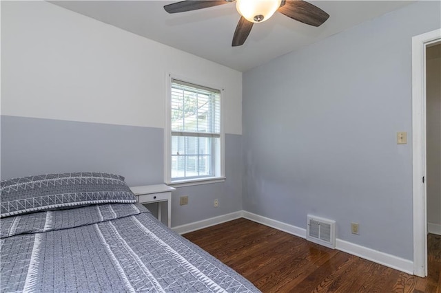 1306 W 29th St S, Independence, MO 64052 - unfurnished bedroom with wood finished floors and ceiling fan
