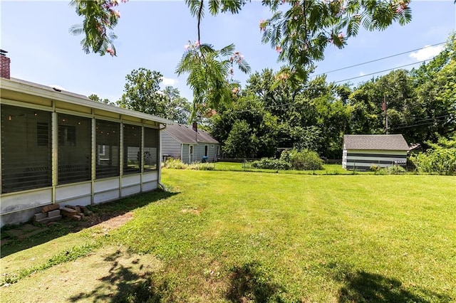 1306 W 29th St S, Independence, MO 64052 - view of green lawn with a sunroom