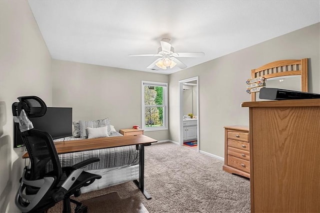 office featuring baseboards, carpet flooring, and ceiling fan