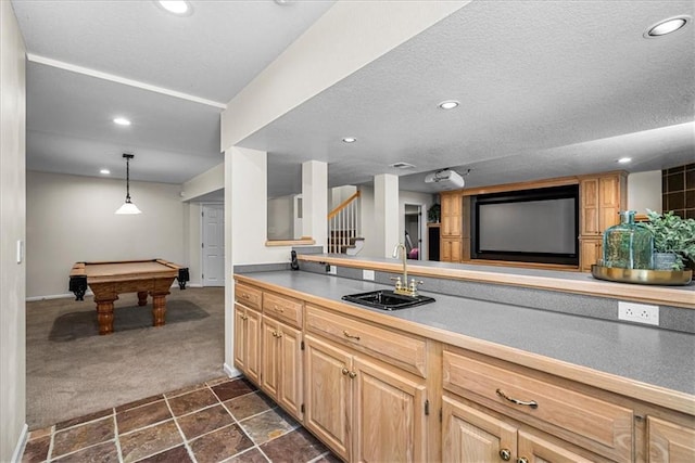 kitchen with a sink, recessed lighting, dark carpet, light brown cabinets, and pool table