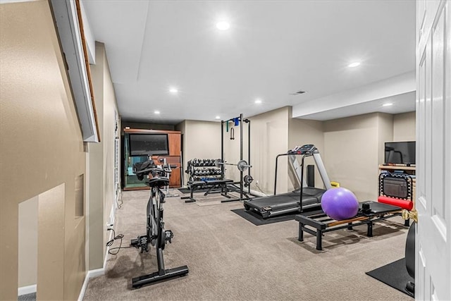 workout room with carpet flooring and recessed lighting