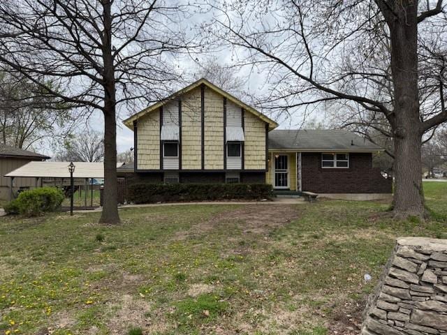 7722 E 90th Ter, Kansas City, MO 64138 - split level home with a front lawn and brick siding