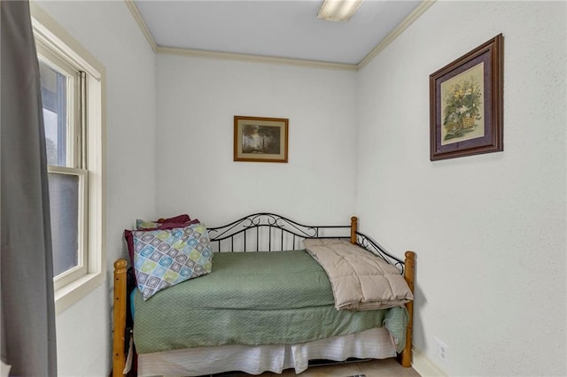 bedroom featuring ornamental molding