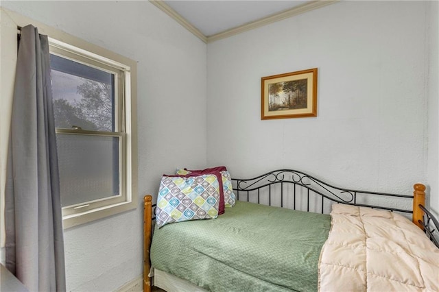 bedroom featuring ornamental molding
