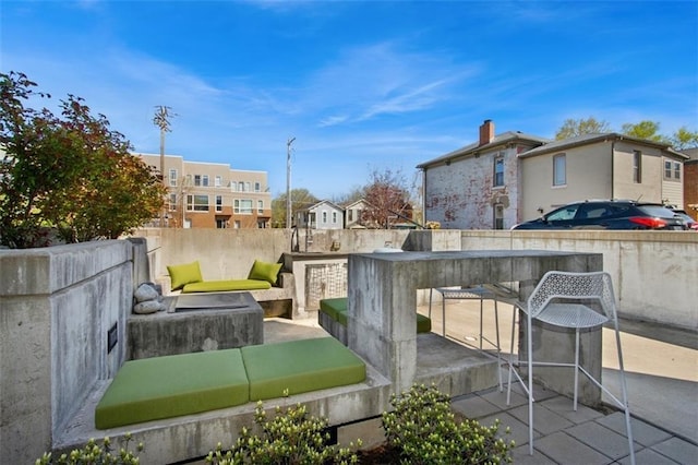1610 Summit St, Kansas City, MO 64108 - view of patio / terrace with outdoor lounge area and a residential view