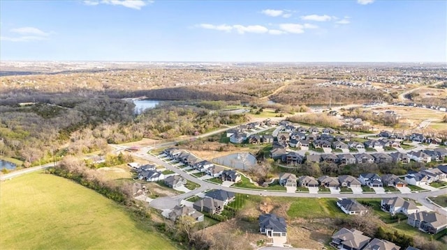 22530 W 87th Ter, Lenexa, KS 66227 - aerial view of property and surrounding area with a large body of water and nearby suburban area