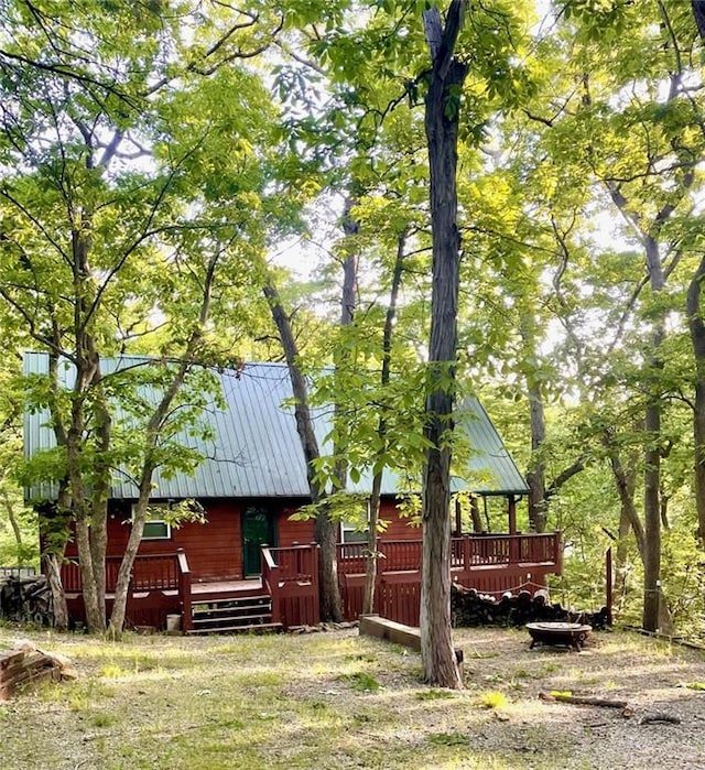 518 SW Lakeside Dr, La Cygne, KS 66040 - view of yard featuring a wooden deck