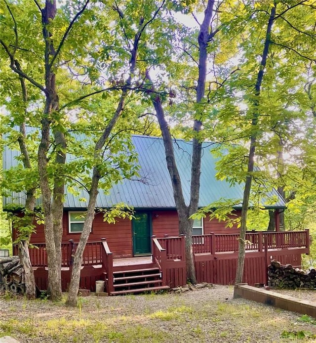 518 SW Lakeside Dr, La Cygne, KS 66040 - back of house with a wooden deck