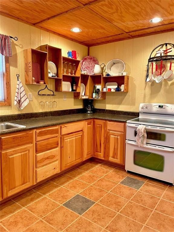 518 SW Lakeside Dr, La Cygne, KS 66040 - kitchen featuring double oven range, wooden ceiling, open shelves, dark countertops, and recessed lighting