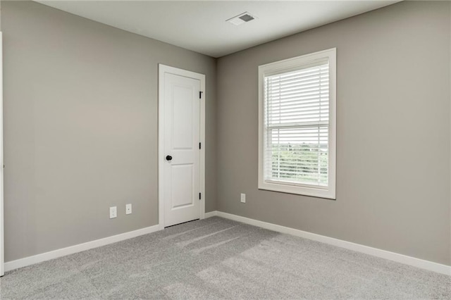 16827 W 164th Ter, Olathe, KS 66062 - carpeted empty room with baseboards