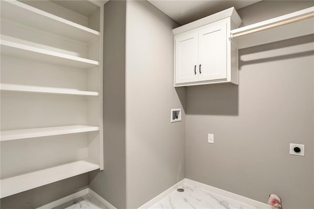 16827 W 164th Ter, Olathe, KS 66062 - laundry area with hookup for an electric dryer, marble finish floors, hookup for a washing machine, and cabinet space