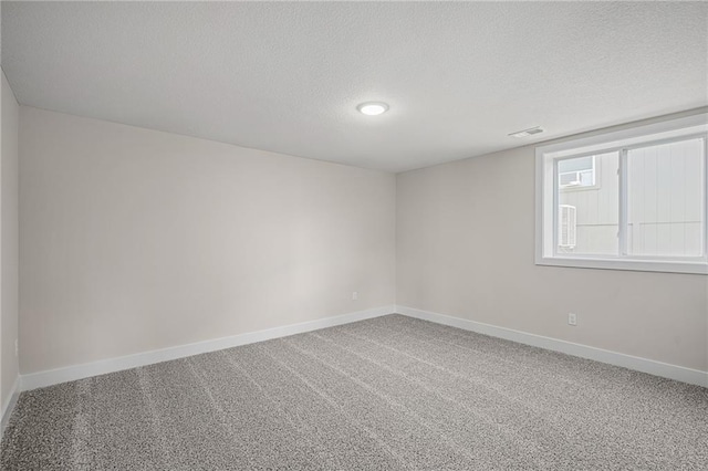 19389 W 114th Ter, Olathe, KS 66061 - carpeted empty room featuring a textured ceiling and baseboards
