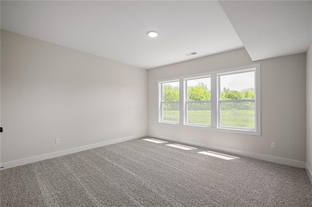 19389 W 114th Ter, Olathe, KS 66061 - carpeted empty room with baseboards and recessed lighting
