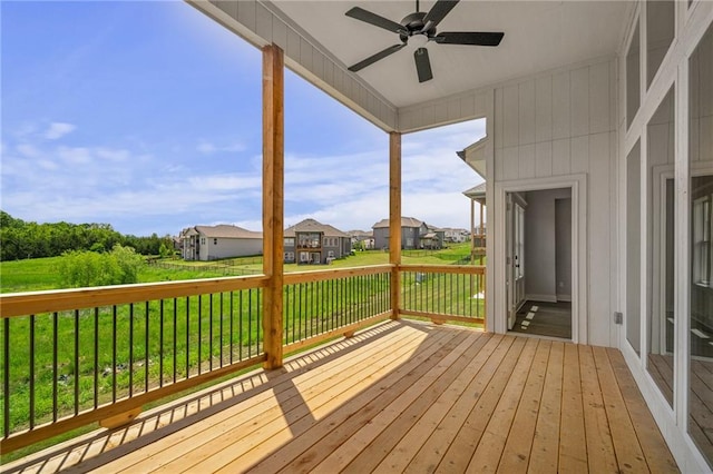 19389 W 114th Ter, Olathe, KS 66061 - deck with ceiling fan, a yard, and a residential view