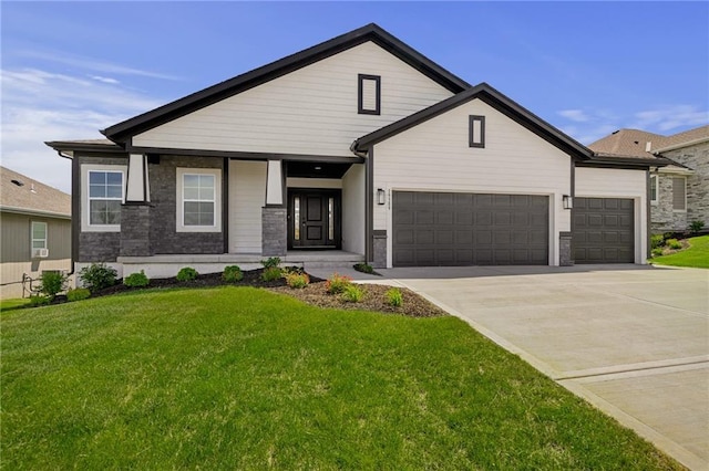 19389 W 114th Ter, Olathe, KS 66061 - view of front of property with a garage, a front lawn, and driveway