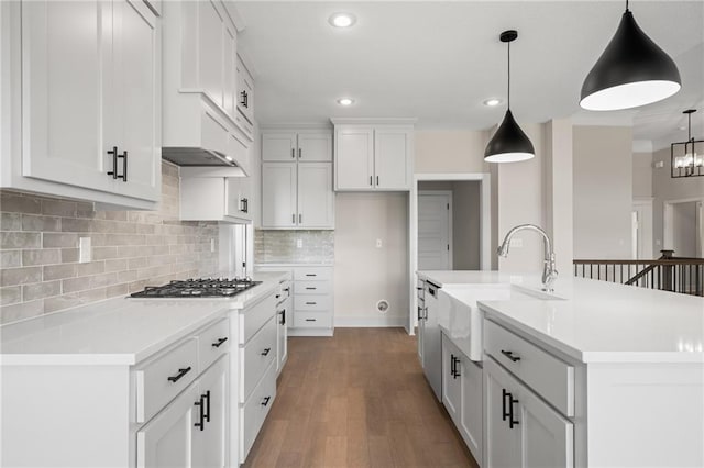 19389 W 114th Ter, Olathe, KS 66061 - kitchen with a sink, stainless steel gas stovetop, tasteful backsplash, white cabinets, and recessed lighting