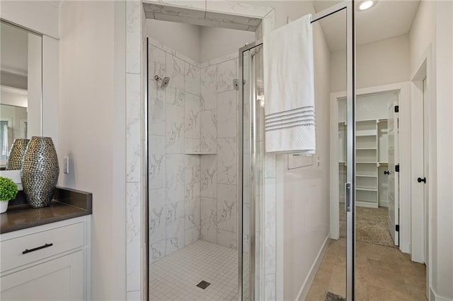 19389 W 114th Ter, Olathe, KS 66061 - full bath with a stall shower, vanity, a walk in closet, recessed lighting, and backsplash
