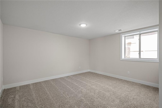 19389 W 114th Ter, Olathe, KS 66061 - carpeted spare room with baseboards and a textured ceiling