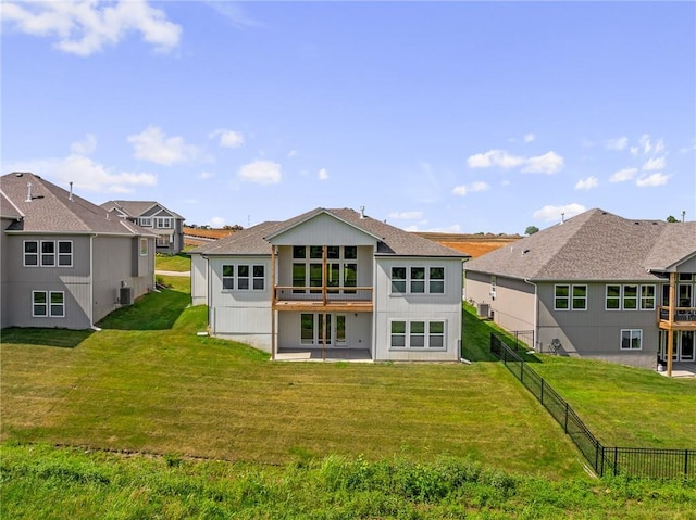 19389 W 114th Ter, Olathe, KS 66061 - rear view of property featuring a fenced backyard, a patio area, a shingled roof, and a residential view