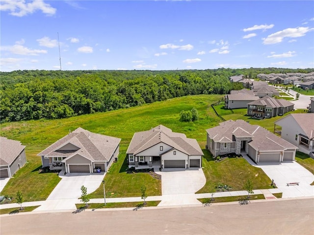 19389 W 114th Ter, Olathe, KS 66061 - aerial view of residential area featuring a heavily wooded area