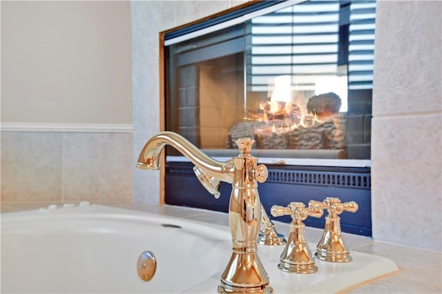 4319 N Mulberry Dr, Kansas City, MO 64116 - interior details with a bathing tub and a sink
