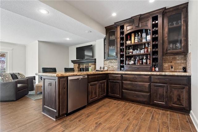4319 N Mulberry Dr, Kansas City, MO 64116 - bar featuring dishwasher, decorative backsplash, and dark wood-type flooring