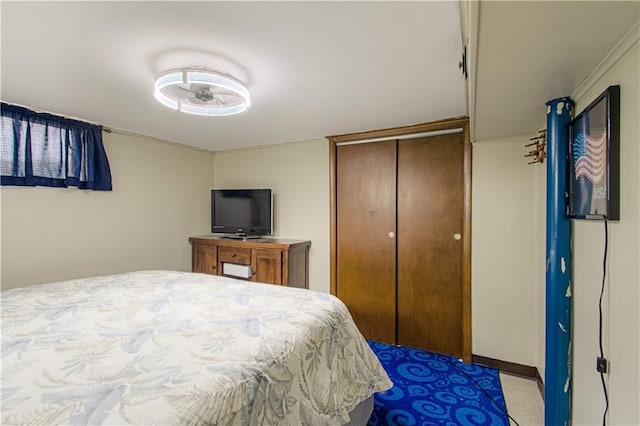 435 NE 41st Ter, Kansas City, MO 64116 - bedroom featuring a closet, carpet flooring, and baseboards