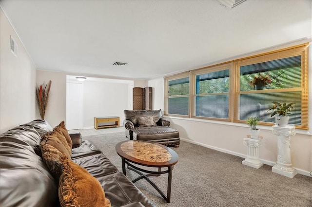 1477 Spruce Ave, Liberty, MO 64068 - carpeted living room featuring visible vents and baseboards