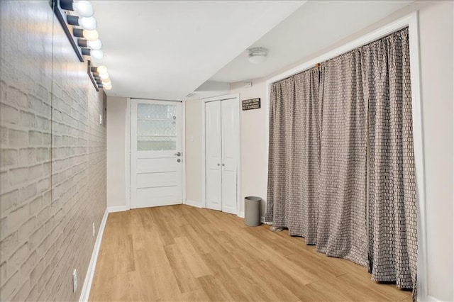 1477 Spruce Ave, Liberty, MO 64068 - hallway featuring baseboards and wood finished floors