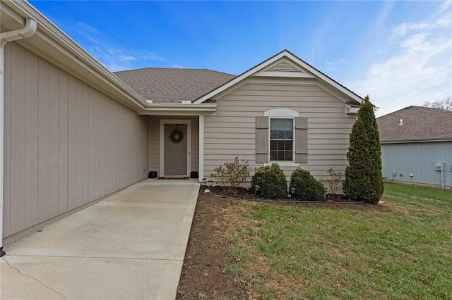 103 N Sivley St, Peculiar, MO 64078 - view of exterior entry with a lawn
