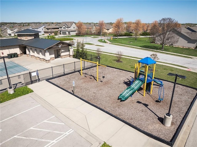 1423 SW Fairfax Rd, Lees Summit, MO 64083 - community play area featuring a residential view