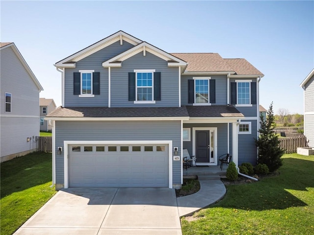 1423 SW Fairfax Rd, Lees Summit, MO 64083 - view of front of home featuring driveway, covered porch, and a garage