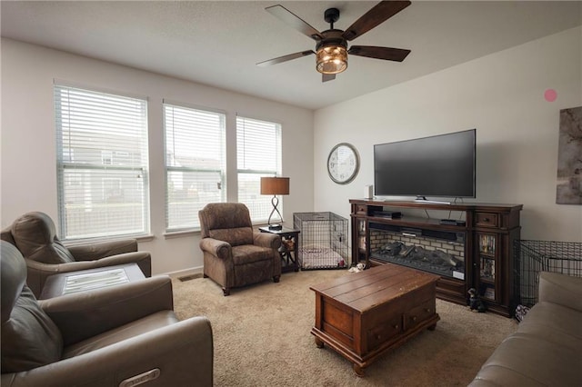1423 SW Fairfax Rd, Lees Summit, MO 64083 - living area with a ceiling fan and carpet flooring