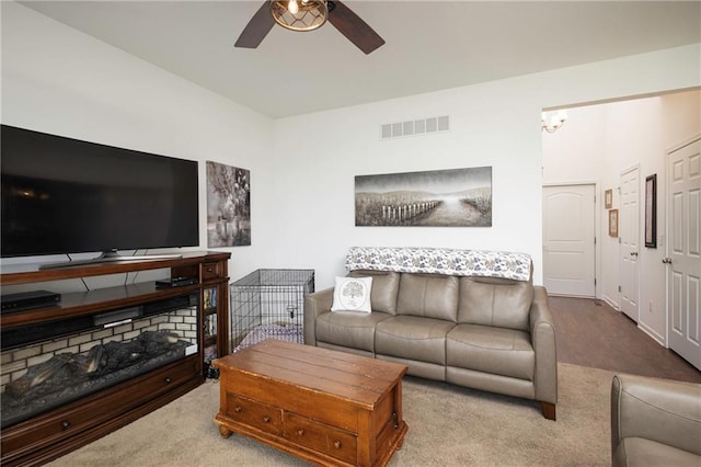 1423 SW Fairfax Rd, Lees Summit, MO 64083 - carpeted living area featuring a ceiling fan