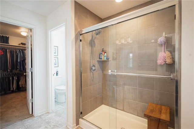 1423 SW Fairfax Rd, Lees Summit, MO 64083 - bathroom featuring a stall shower and a spacious closet