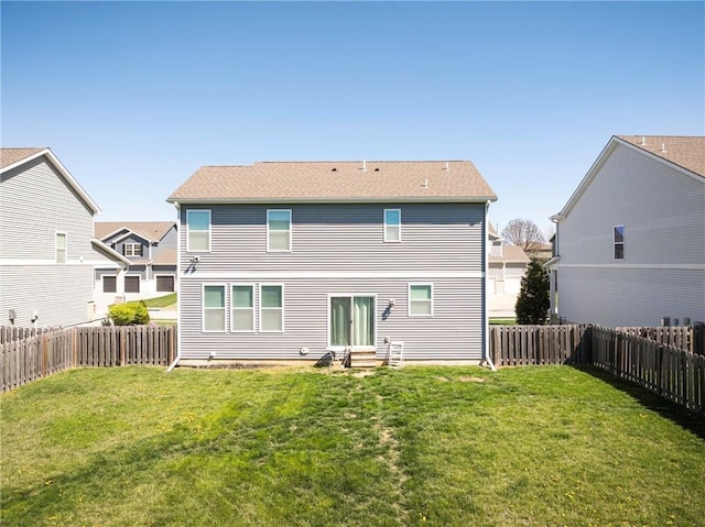 1423 SW Fairfax Rd, Lees Summit, MO 64083 - rear view of house with entry steps and a fenced backyard