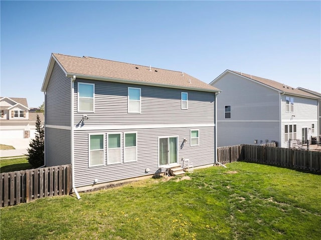 1423 SW Fairfax Rd, Lees Summit, MO 64083 - back of property featuring entry steps and a fenced backyard